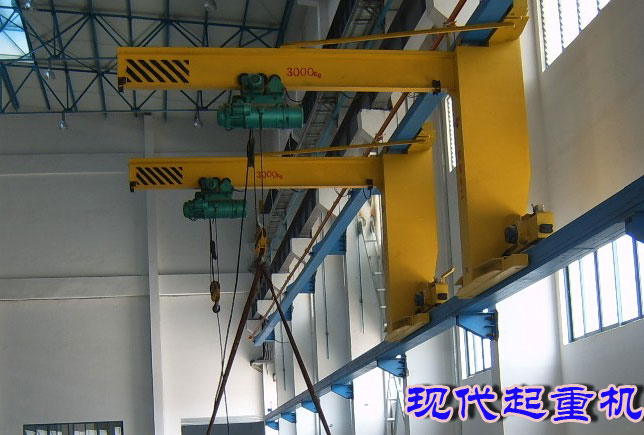 wall travelling jib cranes